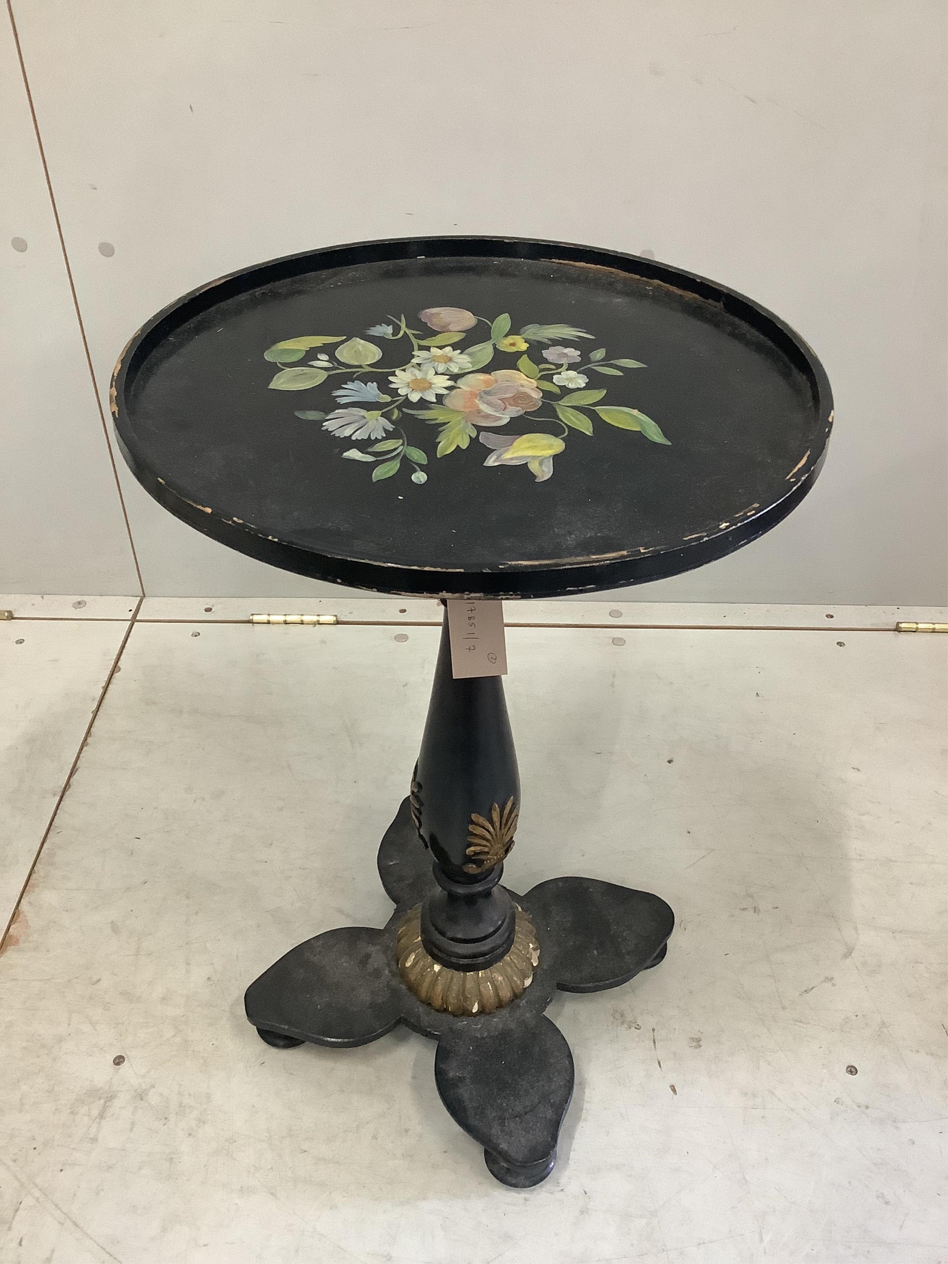 A Victorian oval papier maché tilt top wine table, together with a similar circular table.